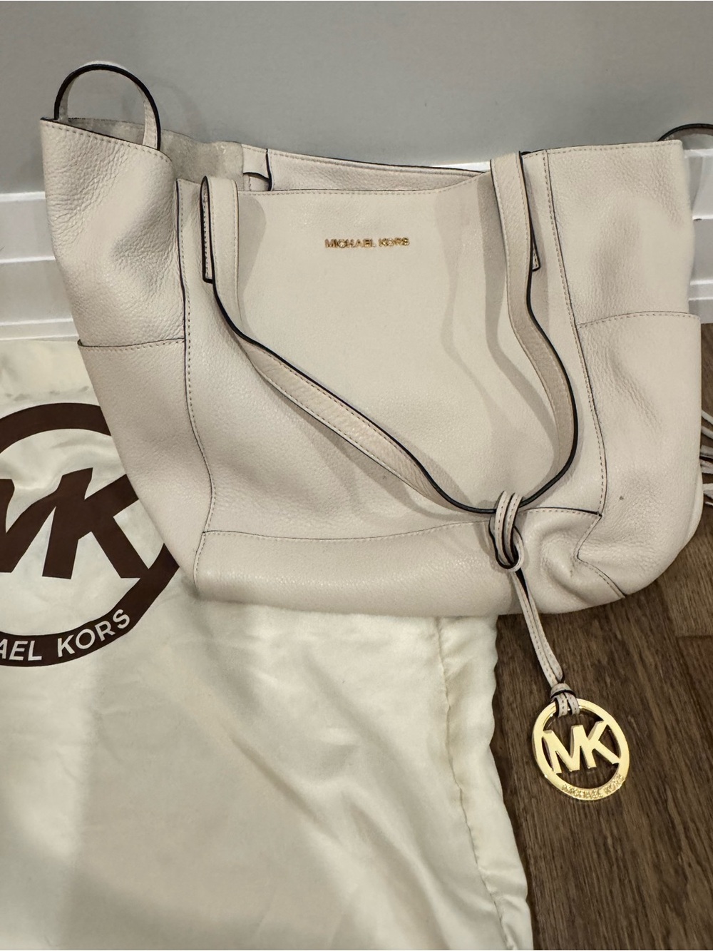 Michael Kors Light Cream Pebbled Leather Tote with Gold MK Charm